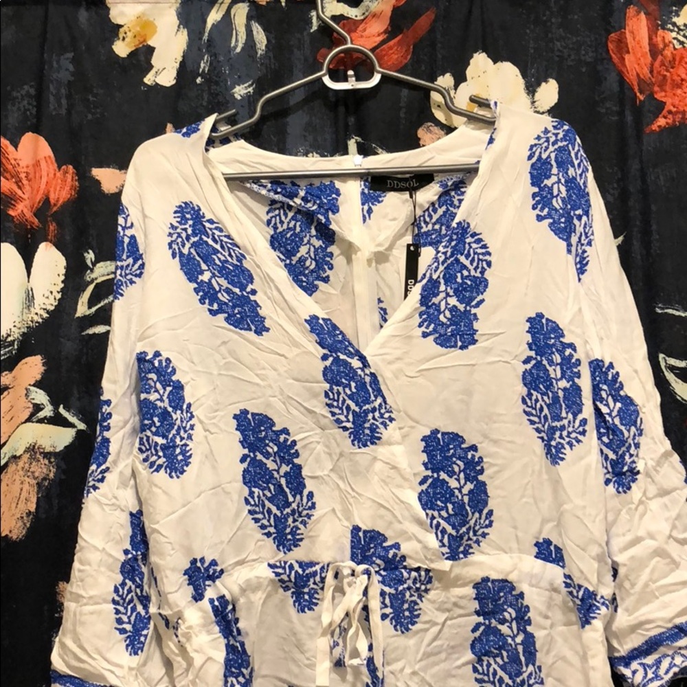 White with blue patterned romper!